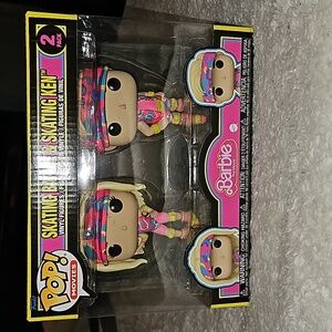 Skating barbie and skating ken funko